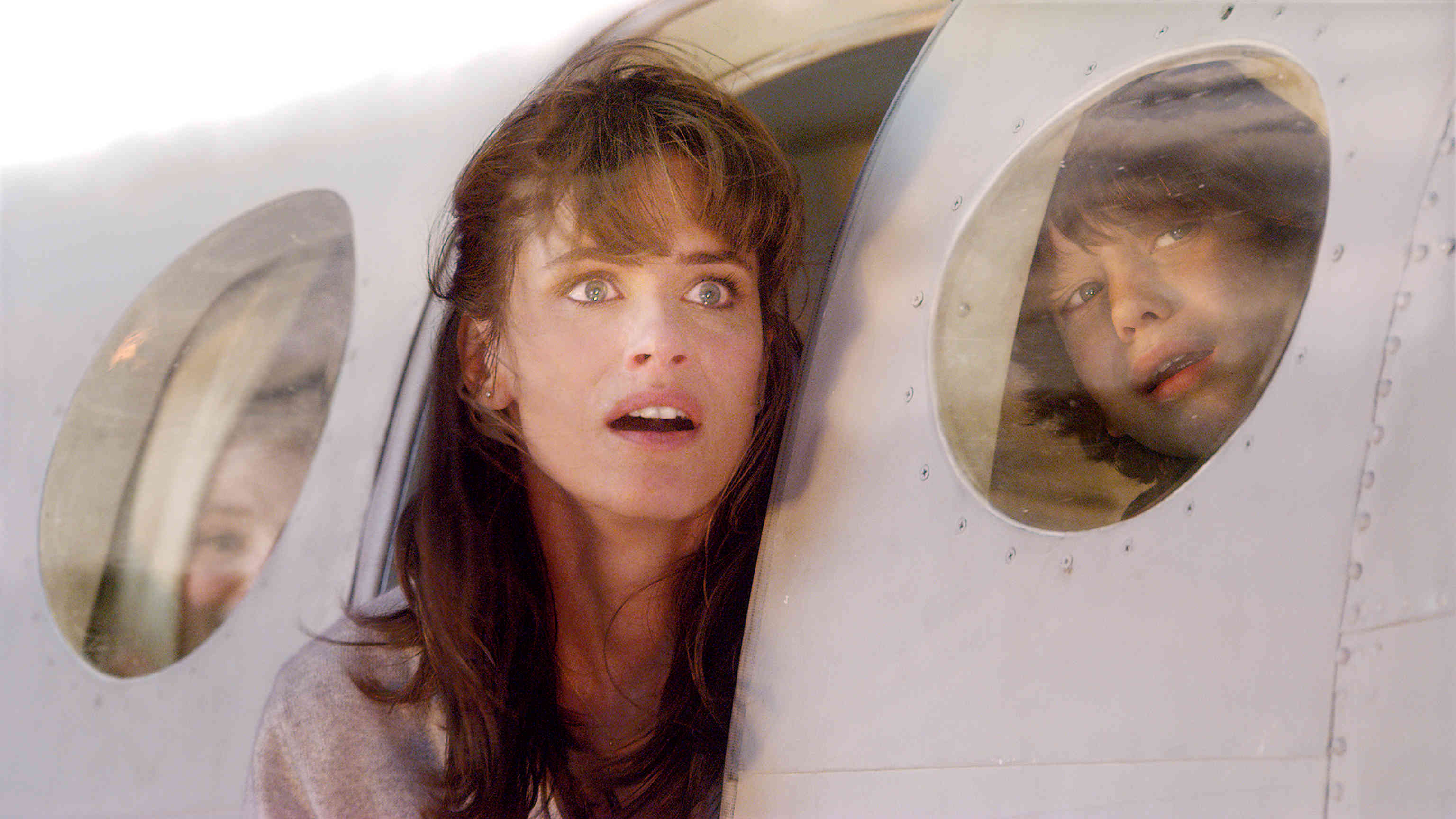 Amanda Peet stars as Kate Curtis and Liam James stars as Noah Curtis in Columbia Pictures' 2012 (2009)