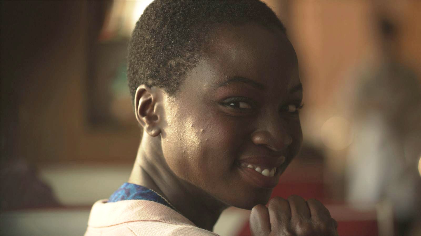 Danai Gurira stars as Woman in Blue Dress in Screen Media Films' 3 Backyards (2011)