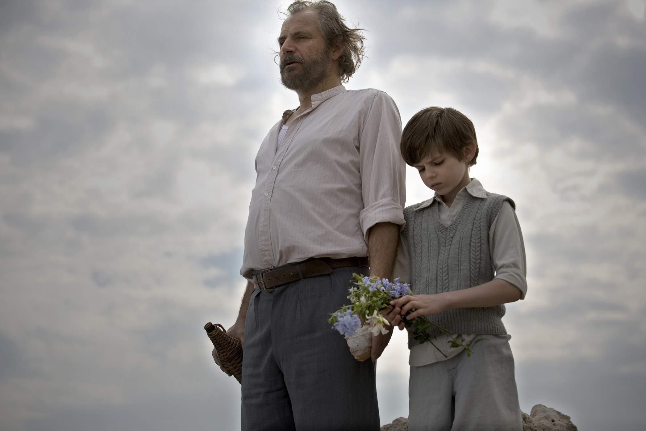 Rade Serbedzija as Athos and Robbie Kay as Young Jakob in Samuel Goldwyn Films' Fugitive Pieces (2008)