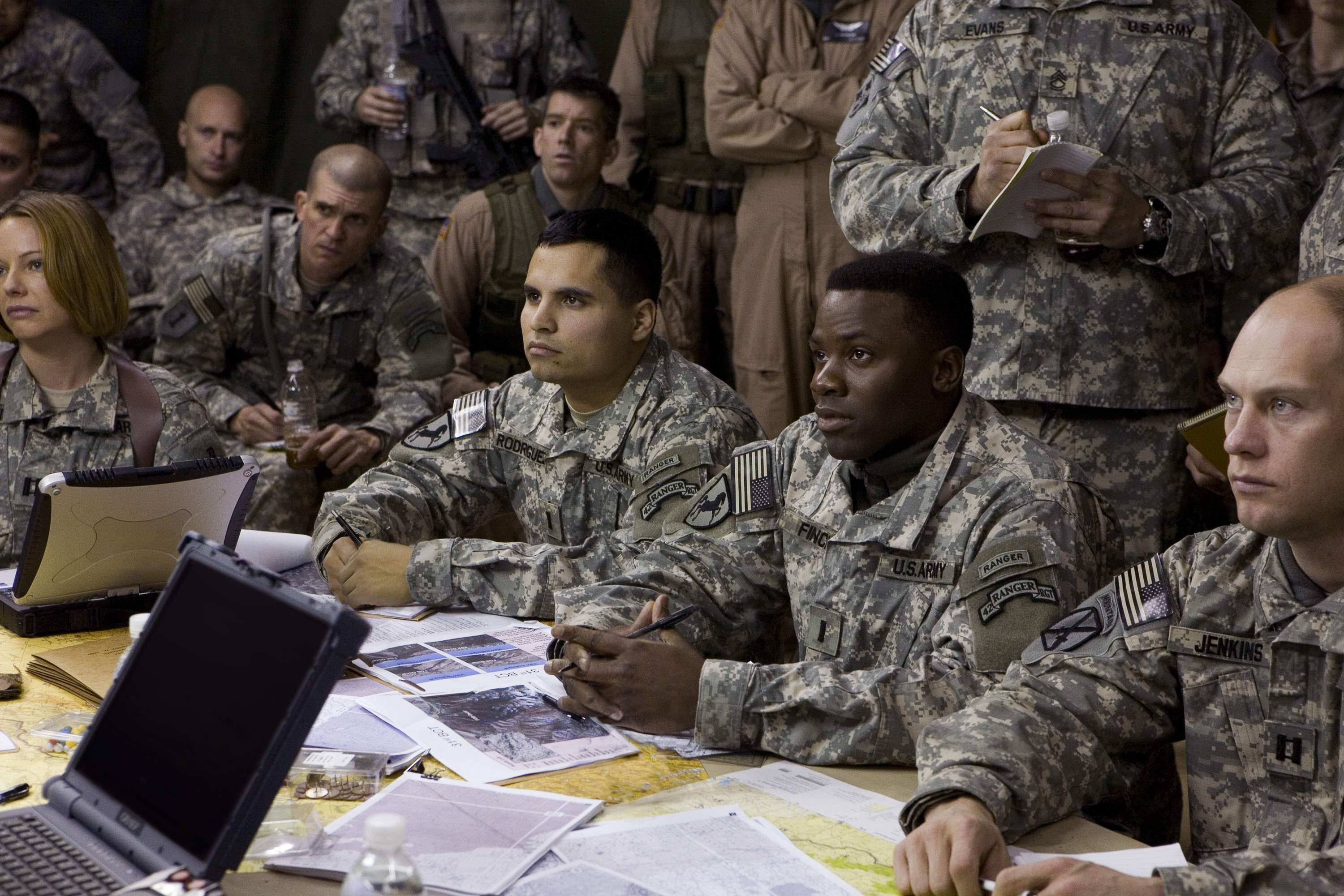 MICHAEL PENA (left center) and DEREK LUKE (right center) star in United Artists/MGM Pictures' LIONS FOR LAMBS (2007). Photo by: David James.