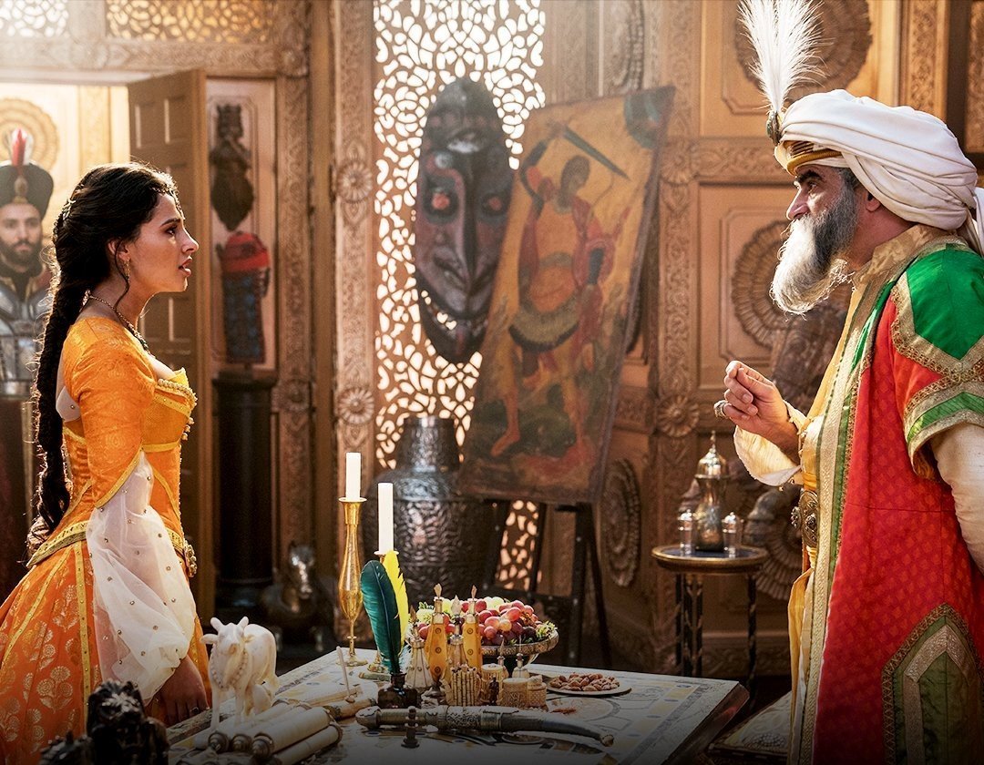 Naomi Scott stars as Jasmine and Navid Negahban stars as Sultan in Walt Disney Pictures' Aladdin (2019)