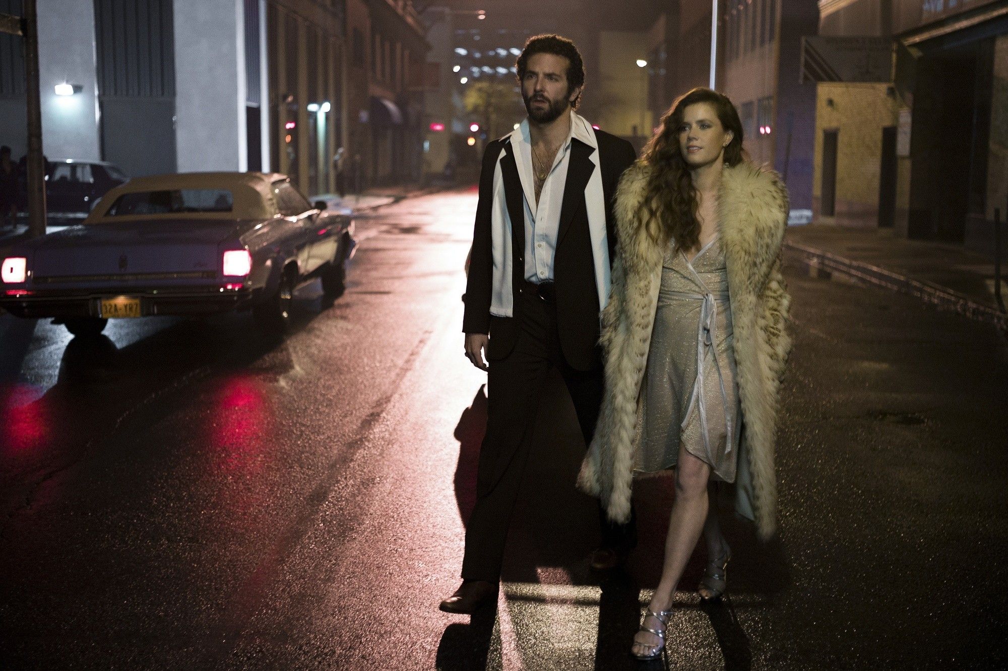 Bradley Cooper stars as Richie DiMaso and Amy Adams stars as Sydney Prosser in Columbia Pictures' American Hustle (2013)