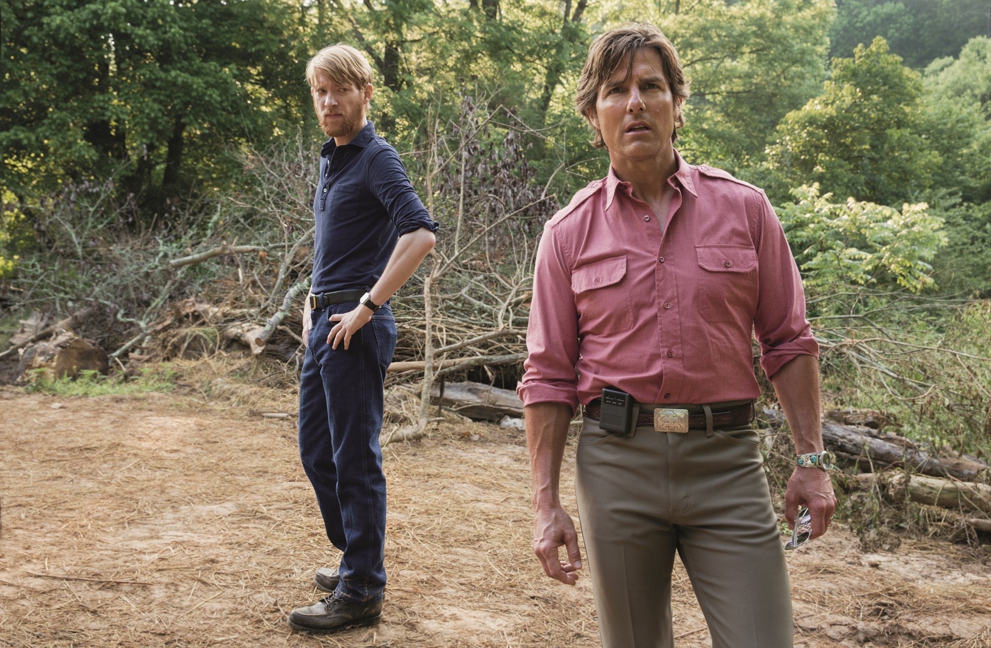 Domhnall Gleeson stars as Monty Schafer and Tom Cruise stars as Barry Seal in Universal Pictures' American Made (2017)