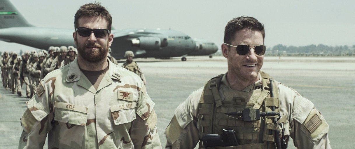 Bradley Cooper stars as Chris Kyle and Sam Jaeger stars as Captain Martens in Warner Bros. Pictures' American Sniper (2014)