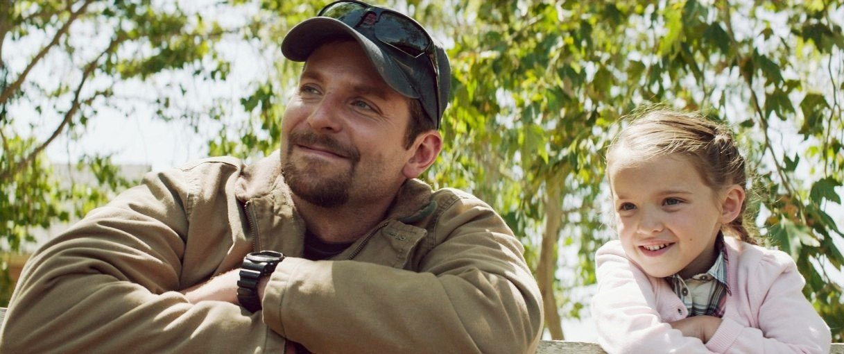 Bradley Cooper stars as Chris Kyle and Madeleine McGraw stars as McKenna Kyle in Warner Bros. Pictures' American Sniper (2014)