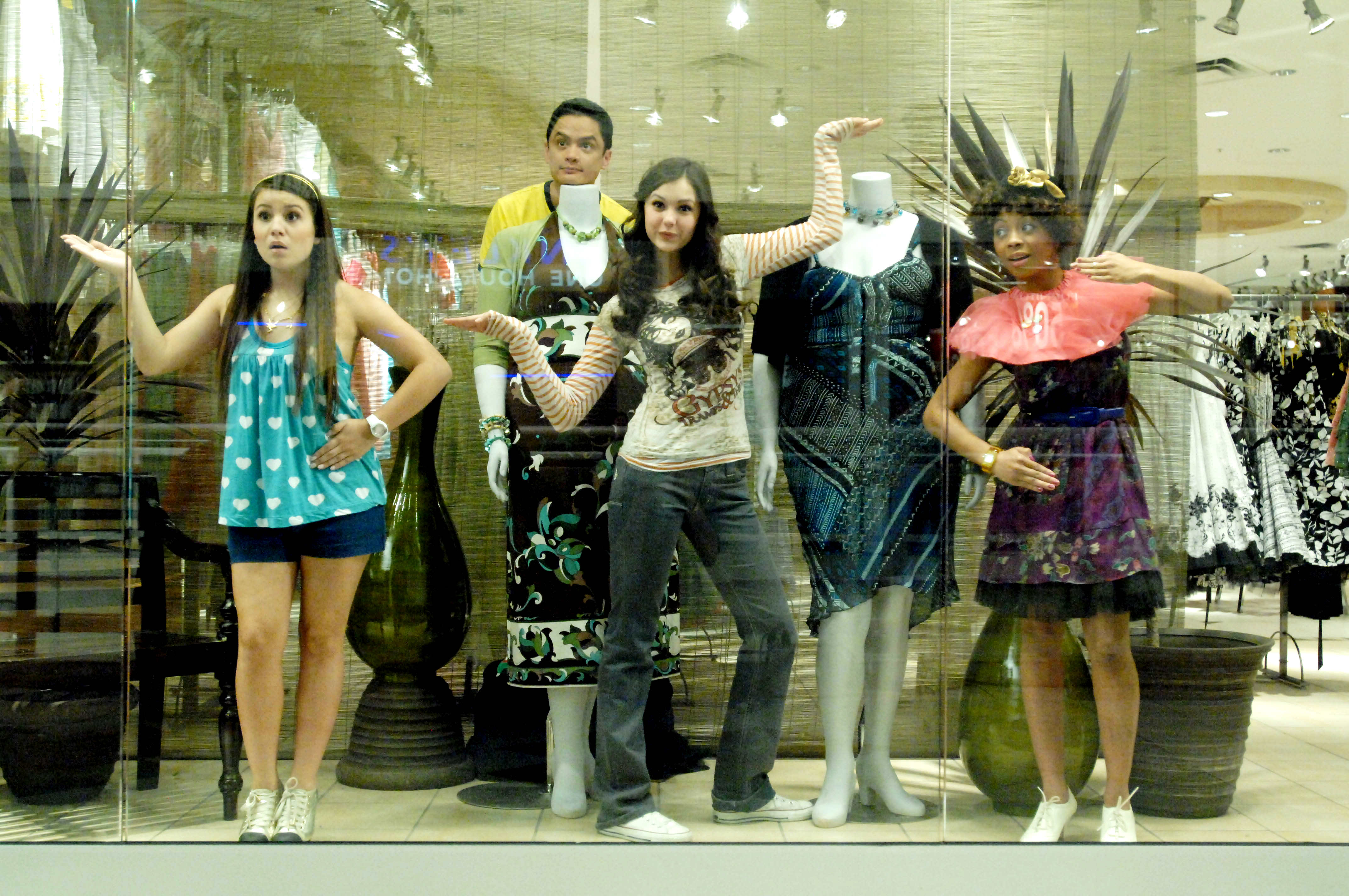 Ally (Nina Dobrev) and friends hide from security in The American Mall (2008)