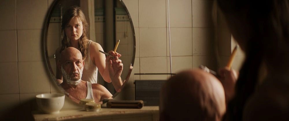Ben Kingsley stars as The General and Hera Hilmar stars as Tanja in Saban Films' An Ordinary Man (2018)