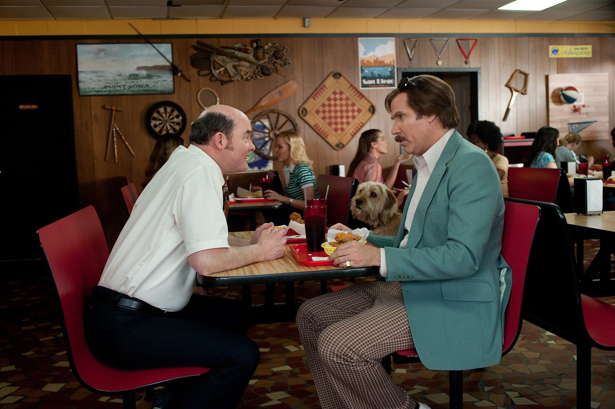 David Koechner stars as Champ Kind and Will Ferrell stars as Ron Burgundy in Paramount Pictures' Anchorman: The Legend Continues (2013)