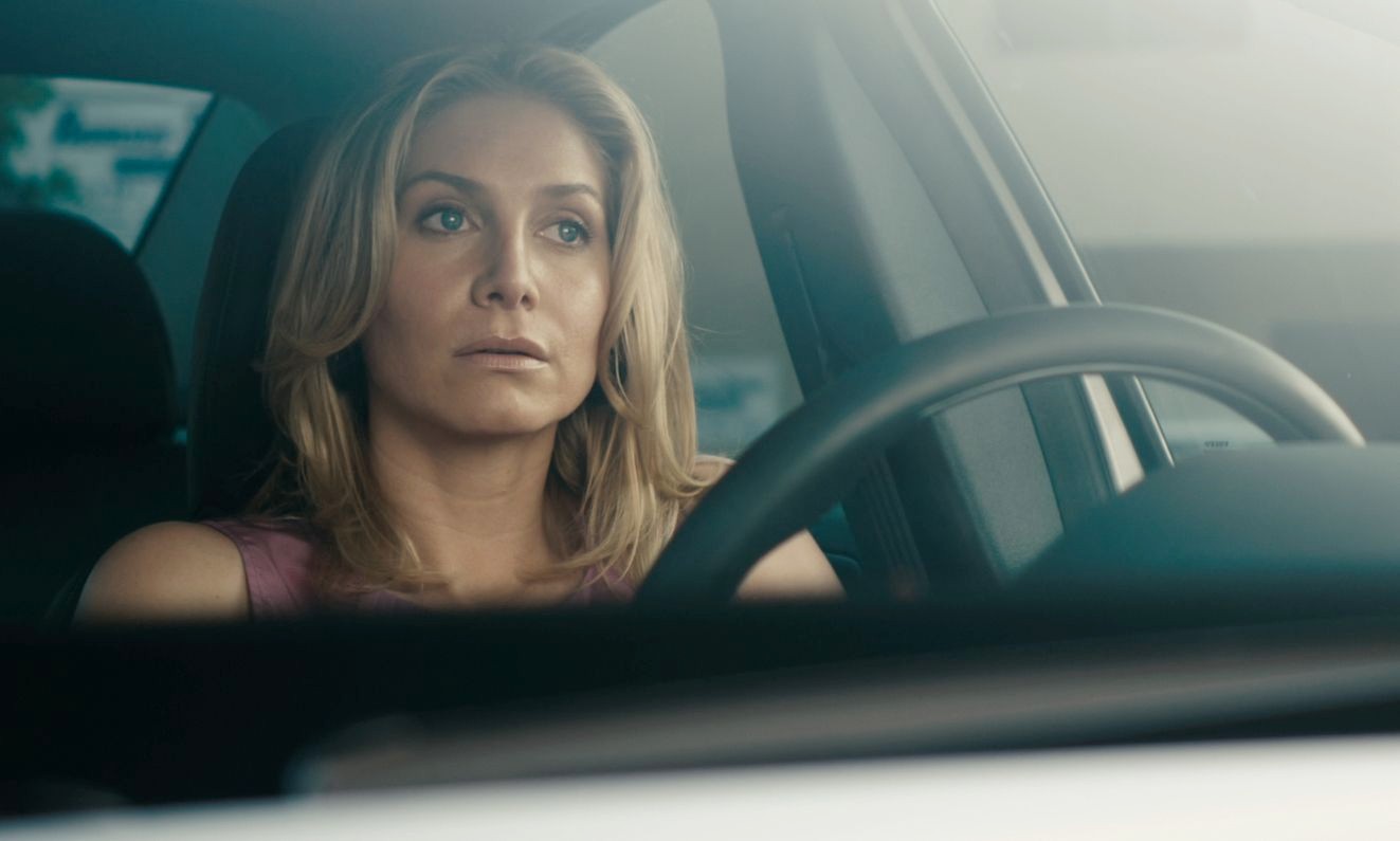 Elizabeth Mitchell stars as Kate in Roadside Attractions' Answers to Nothing (2011)