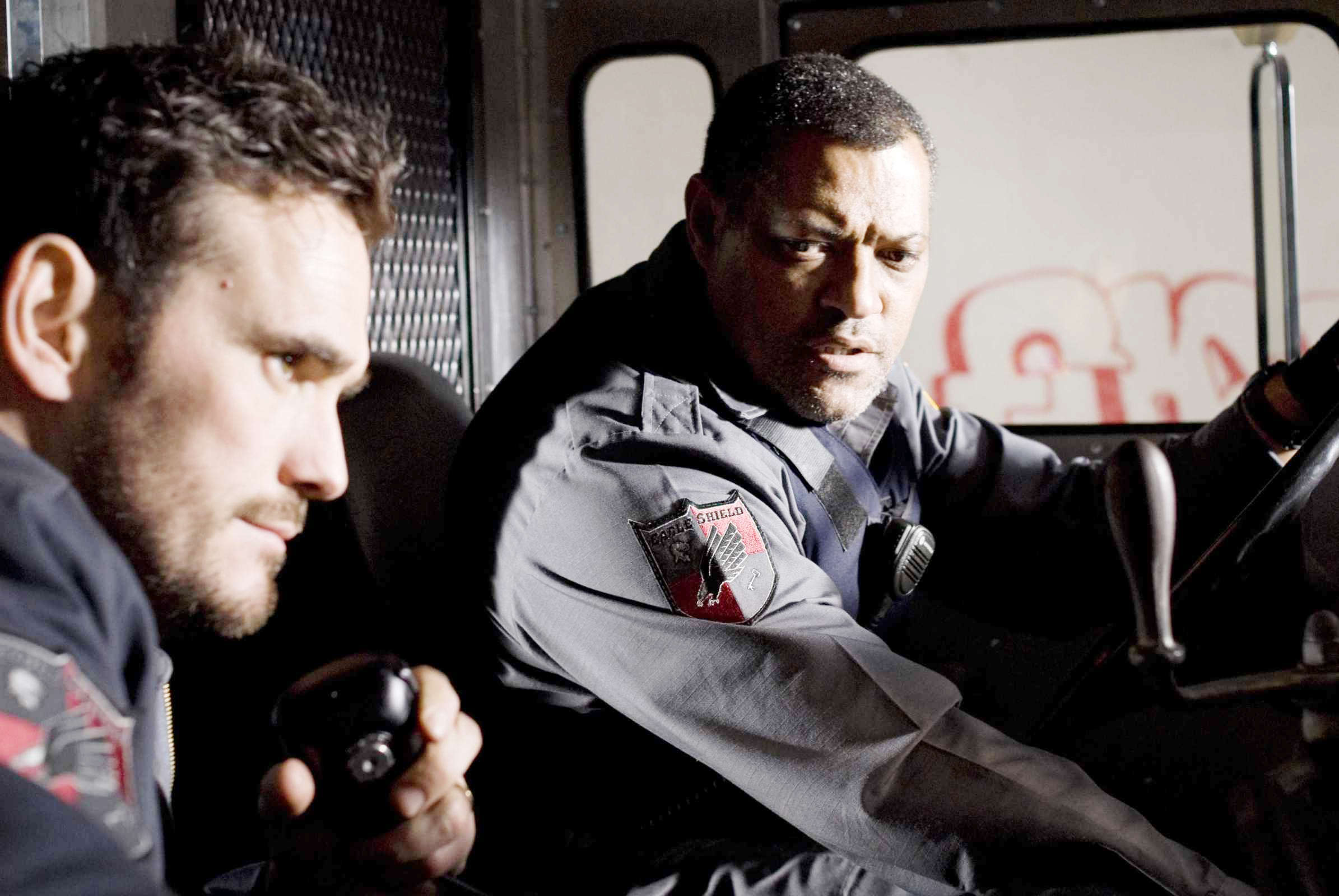 Matt Dillon stars as Mike Cochrone and Laurence Fishburne stars as Baines in Screen Gems' Armored (2009)