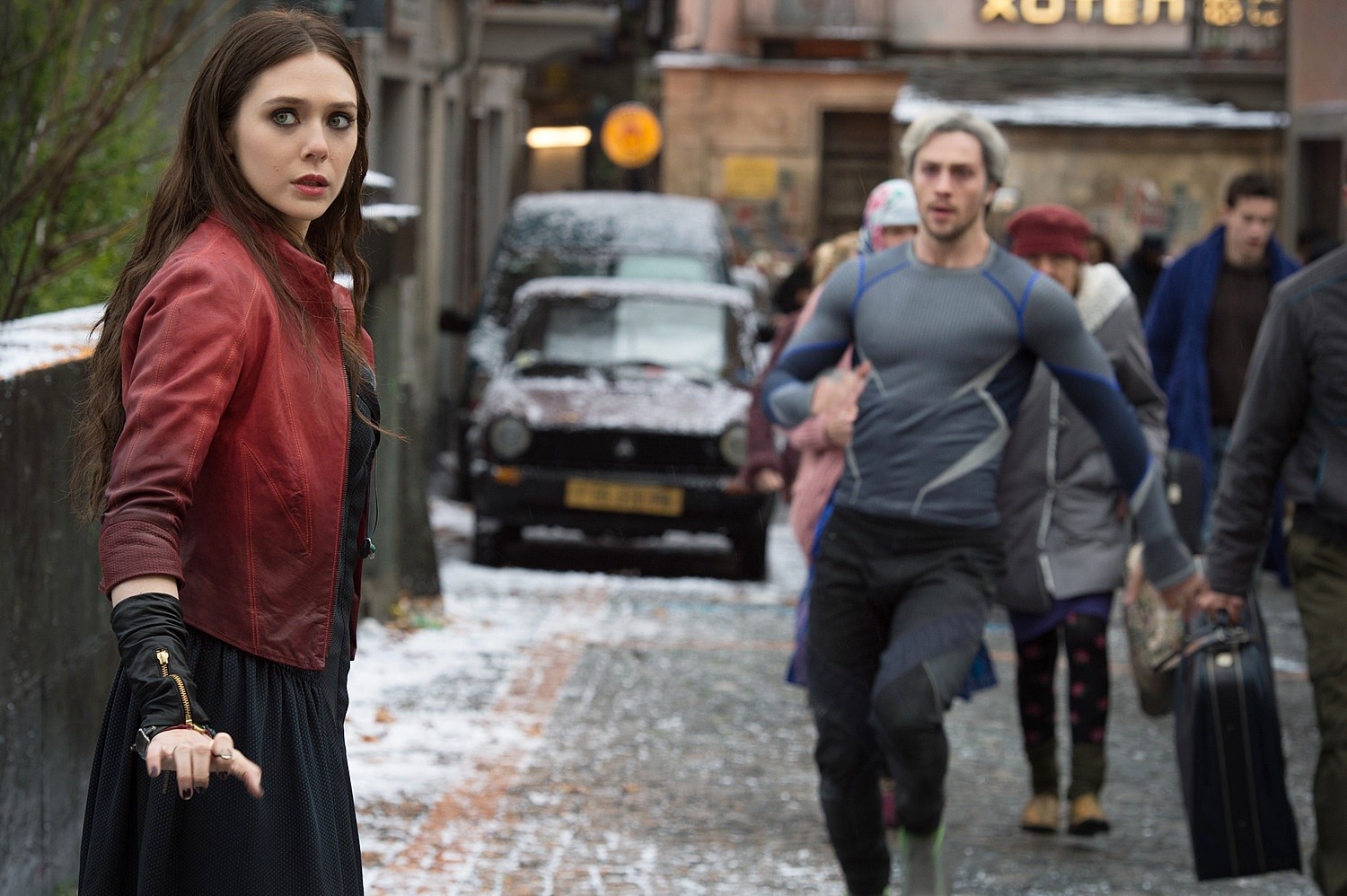 Elizabeth Olsen stars as Wanda Maximoff/Scarlet Witch and Aaron Johnson stars as Pietro Maximoff/Quicksilver in Walt Disney Pictures' Avengers: Age of Ultron (2015)