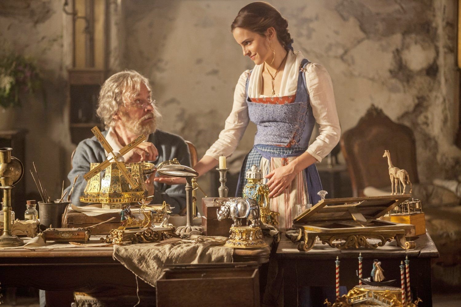 Kevin Kline stars as Maurice and Emma Watson stars as Belle in Walt Disney Pictures' Beauty and the Beast (2017)