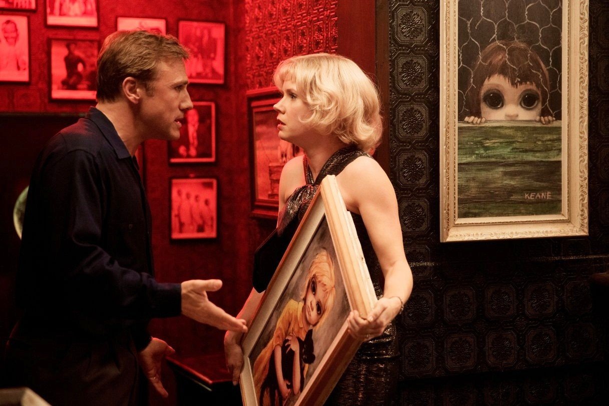 Christoph Waltz stars as Walter Keane and Amy Adams stars as Margaret Keane in The Weinstein Company's Big Eyes (2014). Photo credit by Leah Gallo.
