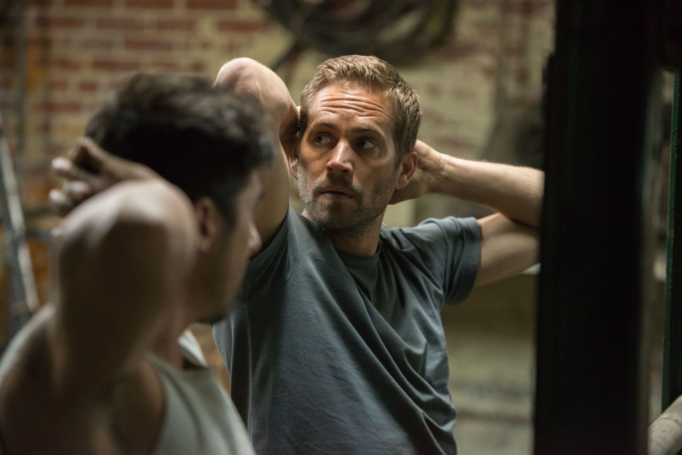 Paul Walker stars as Damien in Relativity Media's Brick Mansions (2014)