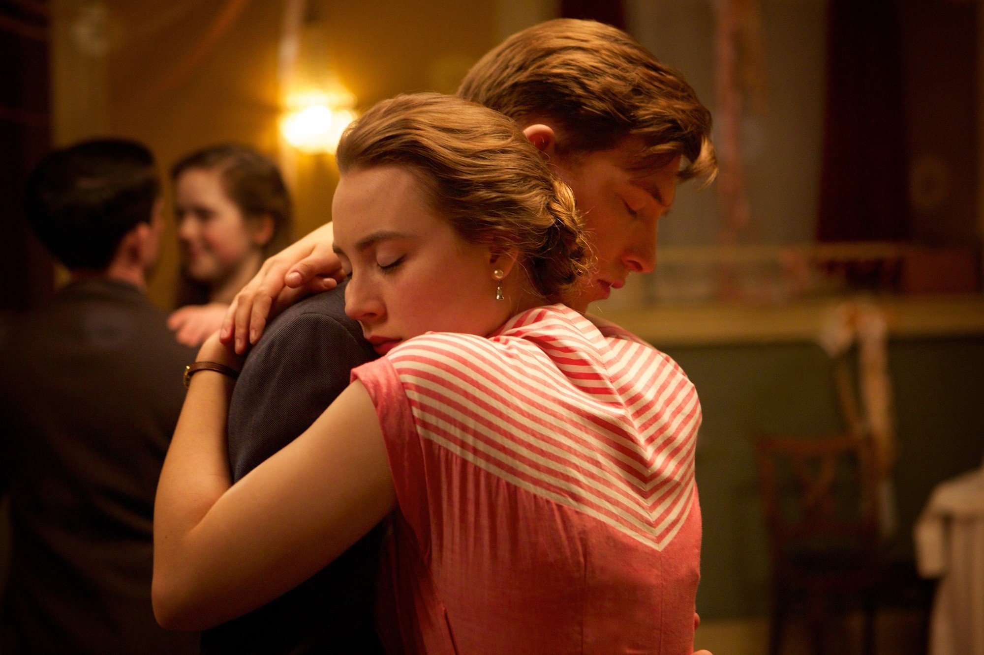 Domhnall Gleeson stars as Jim Farrell and Saoirse Ronan stars as Ellis Lacey in Fox Searchlight Pictures' Brooklyn (2015)