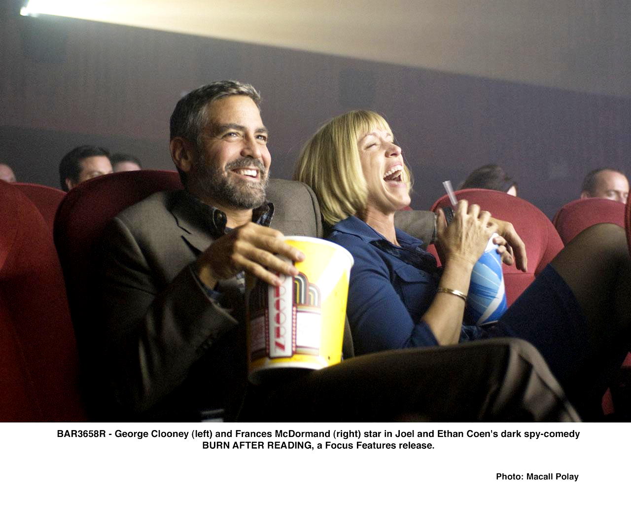George Clooney stars as Harry Pfarrer and Frances McDormand stars as Linda Litzke in Focus Features' Burn After Reading (2008). Photo credit by Macall Polay.