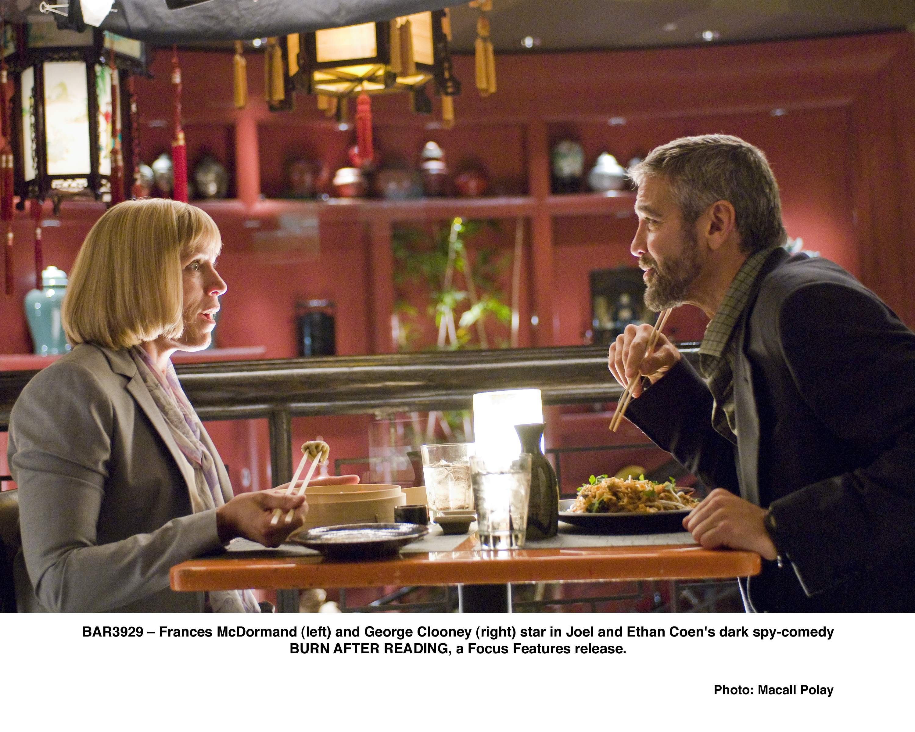 Frances McDormand (left) and George Clooney (right) stars in Joel and Ethan Coen's dark spy-comedy BURN AFTER READING, a Focus Features release.