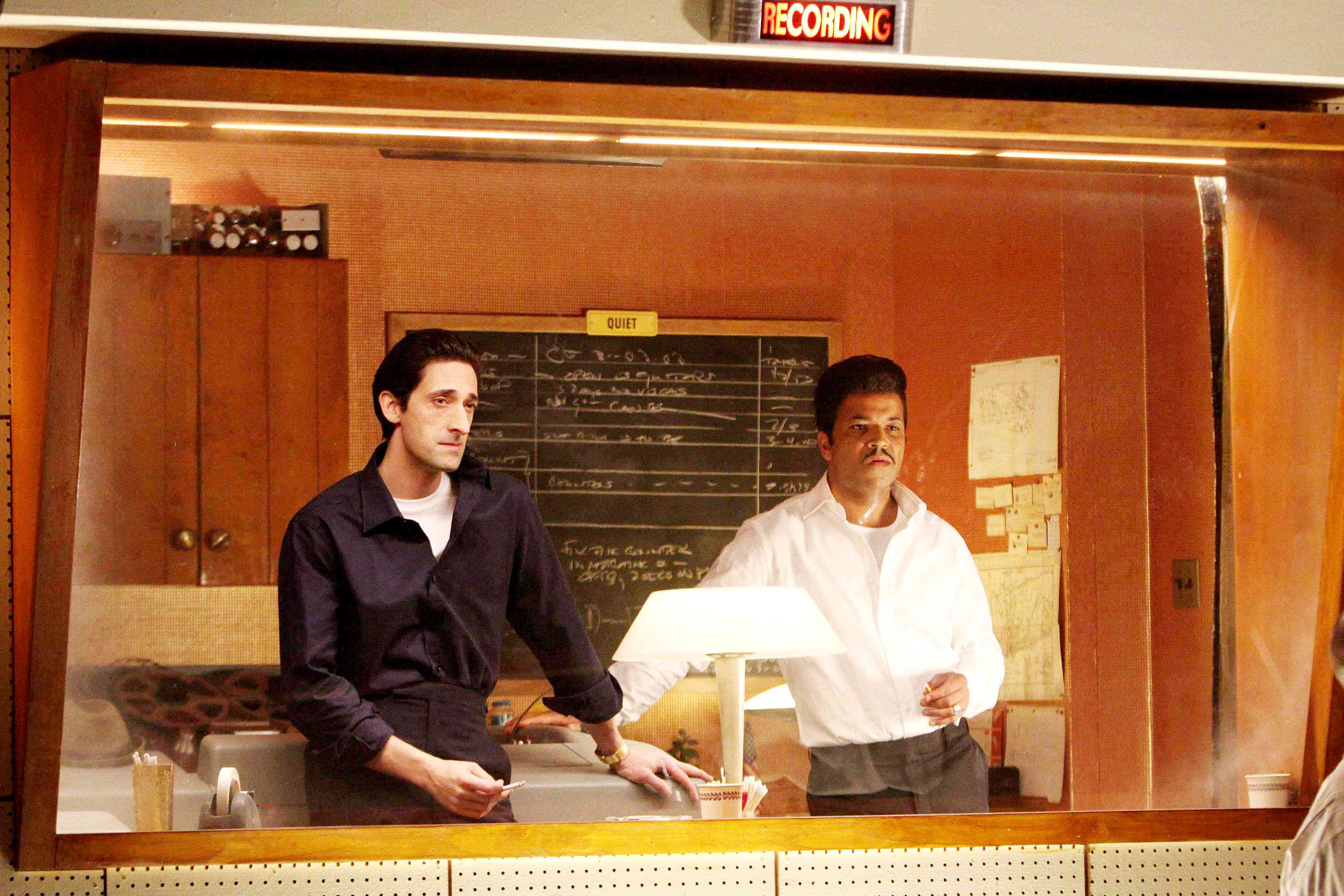 Adrien Brody stars as Leonard Chess and Jeffrey Wright stars as Muddy Waters in Sony BMG Feature Films' Cadillac Records (2008). Photo credit by Eric Liebowitz.