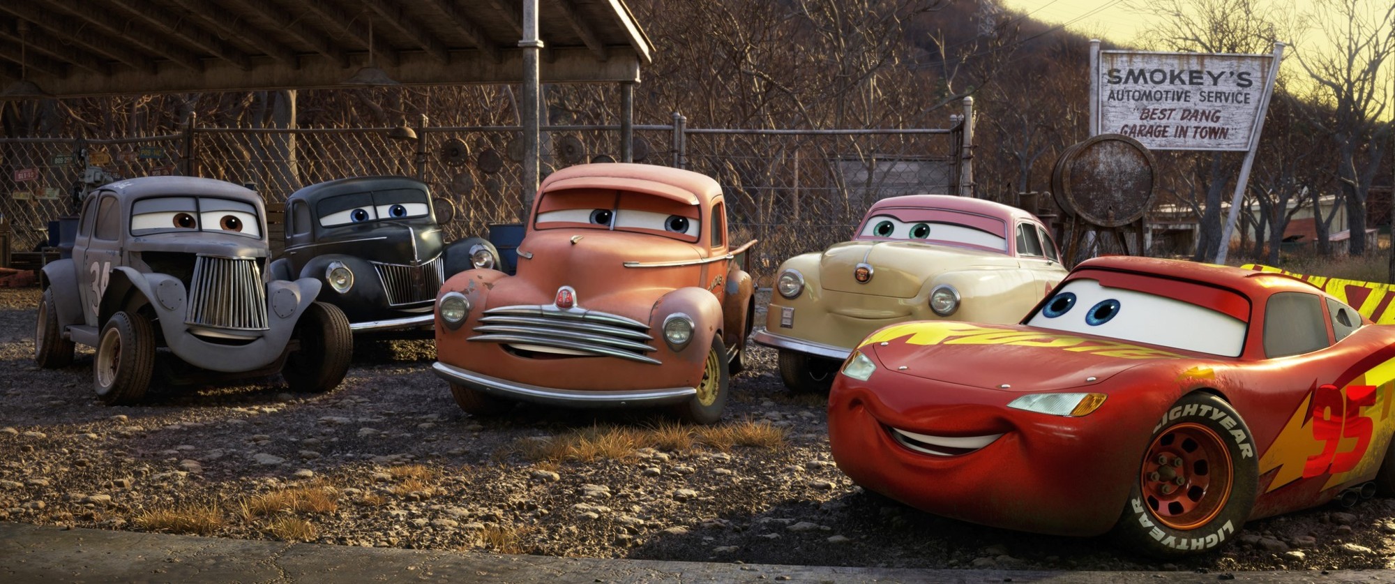 River Scott, Junior Moon, Smokey, Louise Nash and Lightning McQueen from Walt Disney Pictures' Cars 3 (2017)