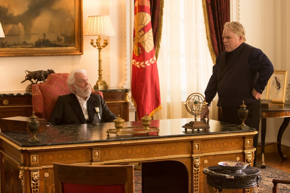 Donald Sutherland stars as President Snow and Philip Seymour Hoffman stars as Plutarch Heavensbee in Lionsgate Films' The Hunger Games: Catching Fire (2013)