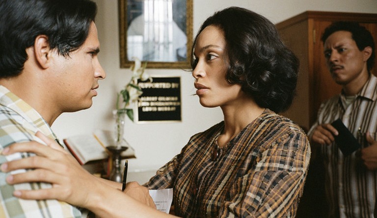 Michael Pena stars as Cesar E. Chavez and Rosario Dawson stars as Dolores Huerta in Lionsgate Films' Cesar Chavez (2014)