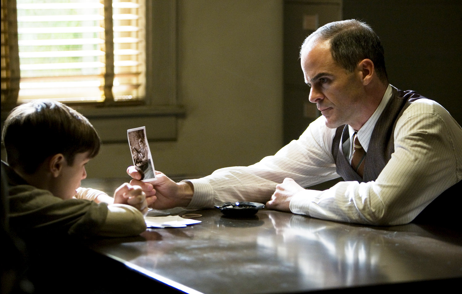 Eddie Alderson stars as Sanford Clark and   	Michael Kelly stars as Det. Lester Ybarra in Universal Pictures' Changeling (2008)