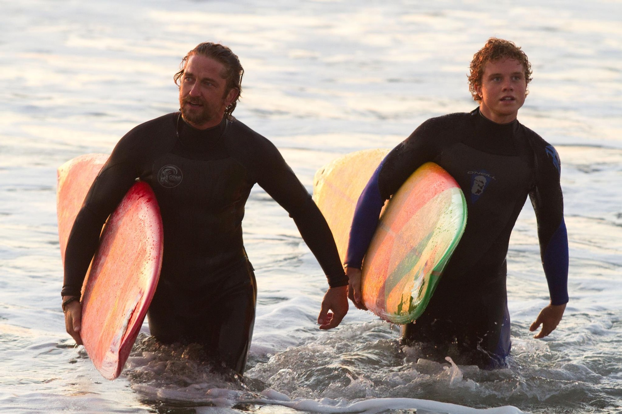 Gerard Butler stars as Frosty Hesson and Jonny Weston stars as Jay Moriarity in 20th Century Fox's Chasing Mavericks (2012)