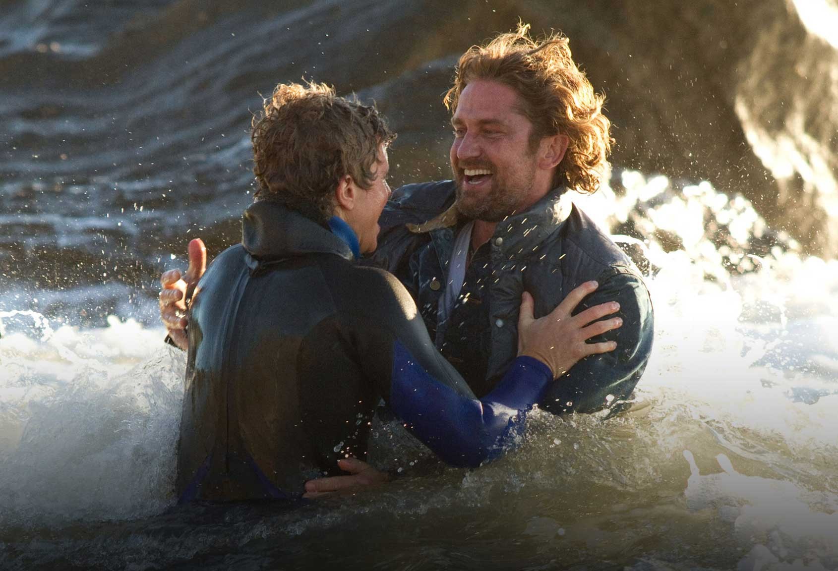 Jonny Weston stars as Jay Moriarity and Gerard Butler stars as Frosty Hesson in 20th Century Fox's Chasing Mavericks (2012)