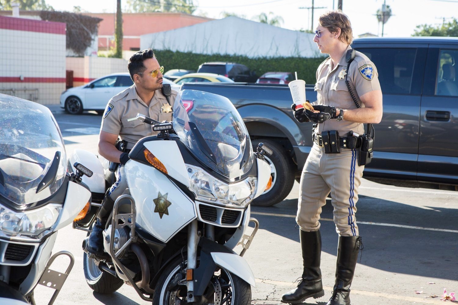 Michael Pena stars as Frank 'Ponch' Poncherello and Dax Shepard stars as Jon Baker in Warner Bros. Pictures' CHiPs (2017)
