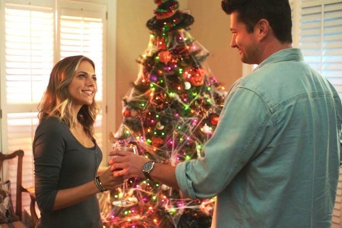 Jana Kramer stars as Holly Logan and Wes Brown stars as Mike in Lifetime's Christmas in Mississippi (2017)