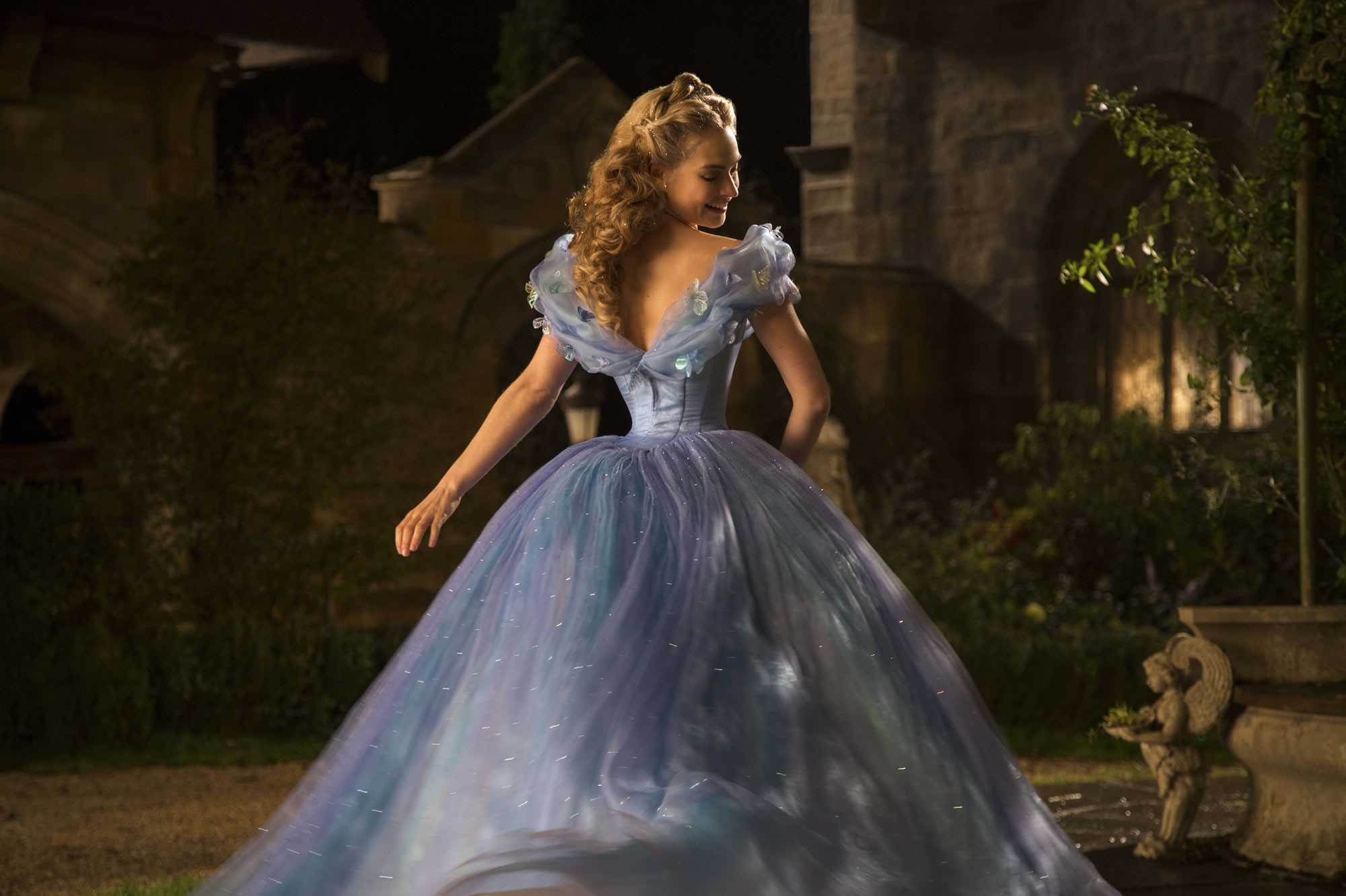 Lily James stars as Cinderella in Walt Disney Pictures' Cinderella (2015). Photo credit by Jonathan Olley.