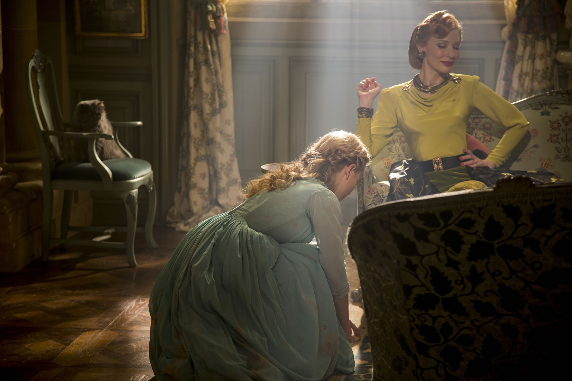 Lily James stars as Cinderella and Cate Blanchett stars as Lady Tremaine in Walt Disney Pictures' Cinderella (2015). Photo credit by Jonathan Olley.