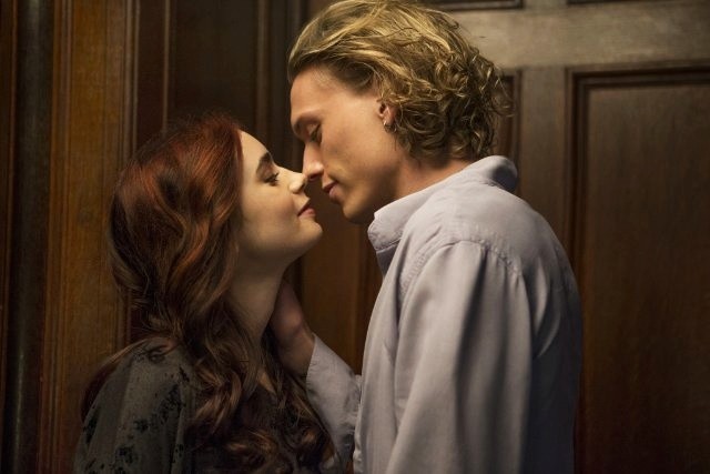 Lily Collins stars as Clary Fray and Jamie Campbell Bower stars as Jace Wayland in Screen Gems' The Mortal Instruments: City of Bones (2013). Photo credit by Rafy.