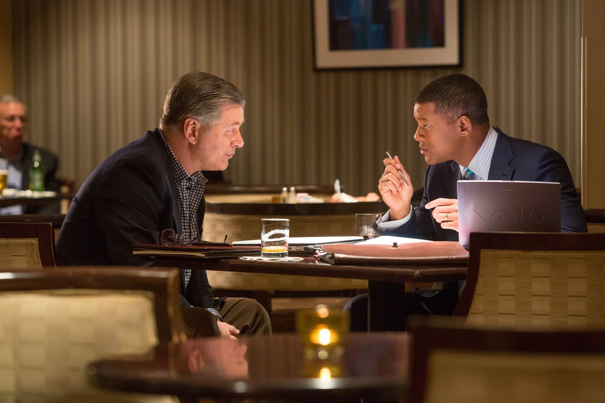 Alec Baldwin stars as Dr. Julian Bailes and Will Smith stars as Dr. Bennet Omalu in Columbia Pictures' Concussion (2015)