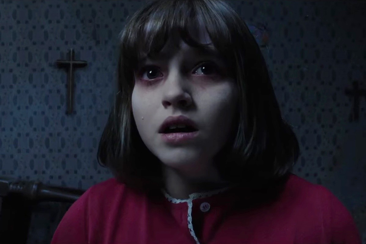 Madison Wolfe stars as Janet Hodgson in Warner Bros. Pictures' The Conjuring 2 (2016)