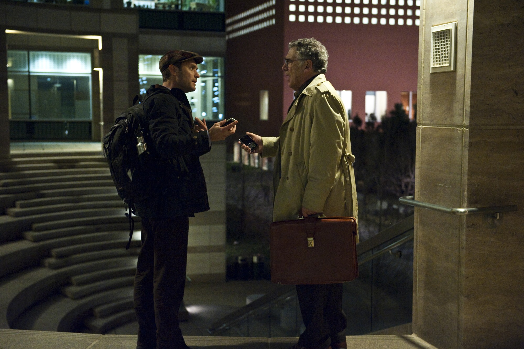 Jude Law stars as Alan Krumwiede and Elliott Gould stars as Dr. Ian Sussman in Warner Bros. Pictures' Contagion (2011)