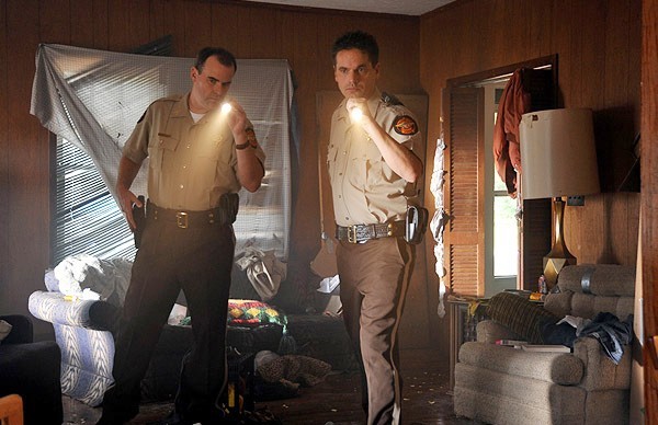 Alex Kendrick stars as Adam Mitchell and Kevin Downes stars as Shane Fuller in TriStar's Courageous (2011)