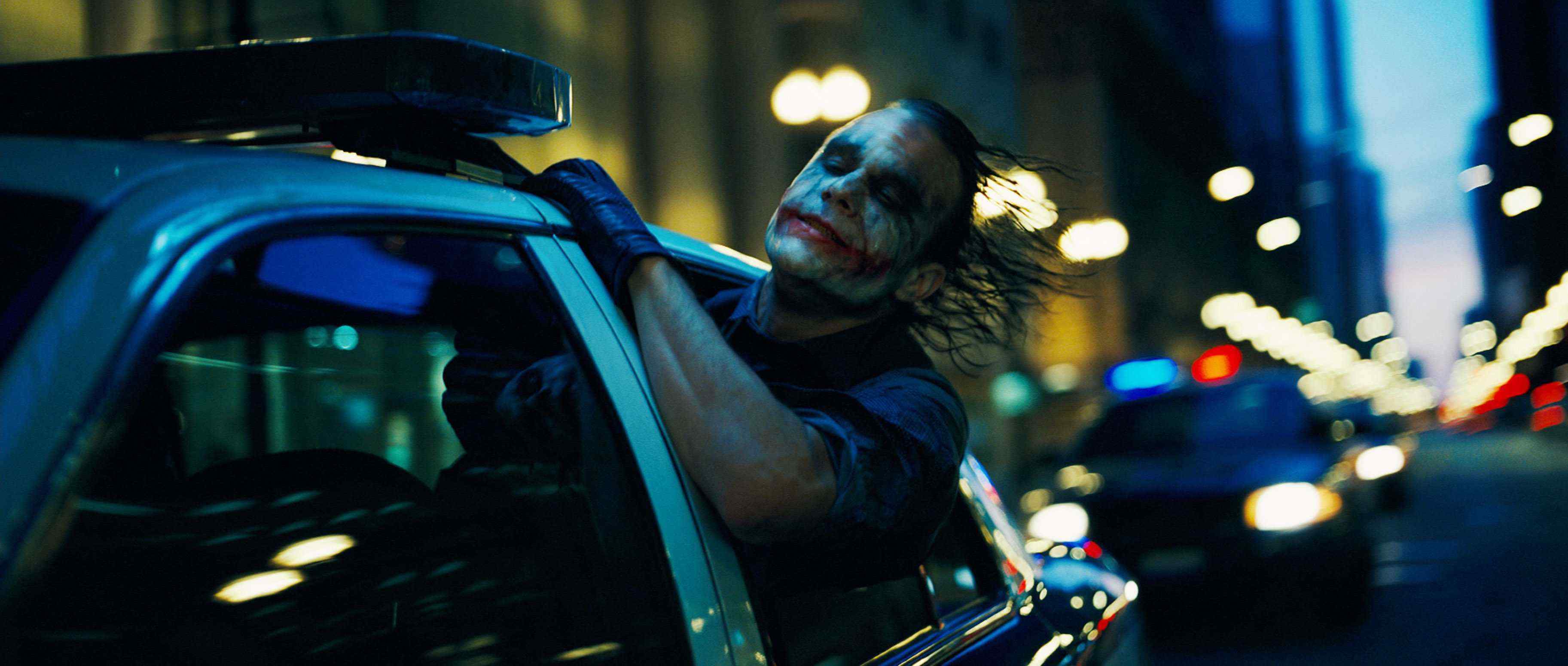 HEATH LEDGER stars as Joker in Warner Bros. Pictures' and Legendary Pictures' action drama 