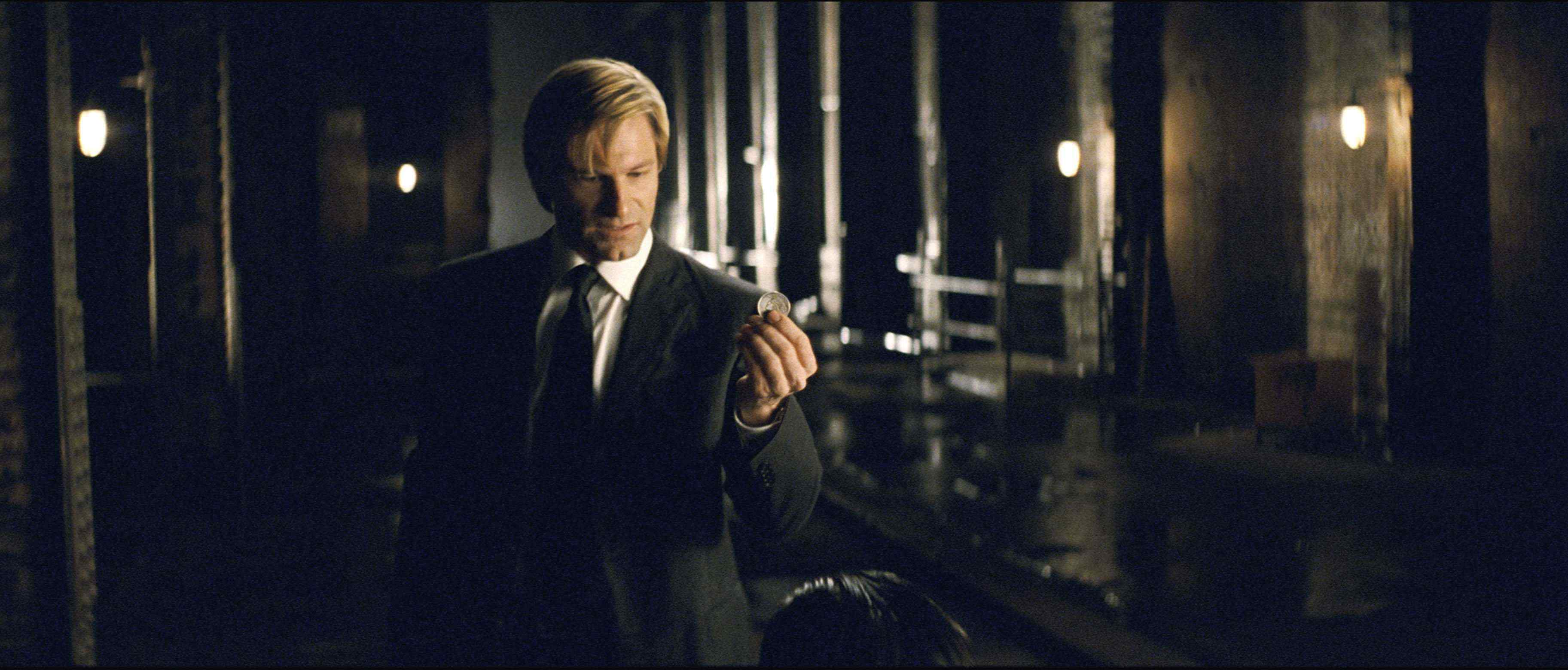 AARON ECKHART stars as Harvey Dent in Warner Bros. Pictures' and Legendary Pictures' action drama 