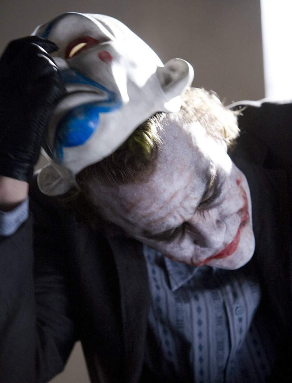 HEATH LEDGER stars as Joker in Warner Bros. Pictures' and Legendary Pictures' action drama 