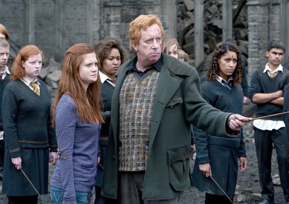 Bonnie Wright stars as Ginny Weasley and Mark Williams stars as Arthur Weasley in Warner Bros. Pictures' Harry Potter and the Deathly Hallows: Part II (2011)