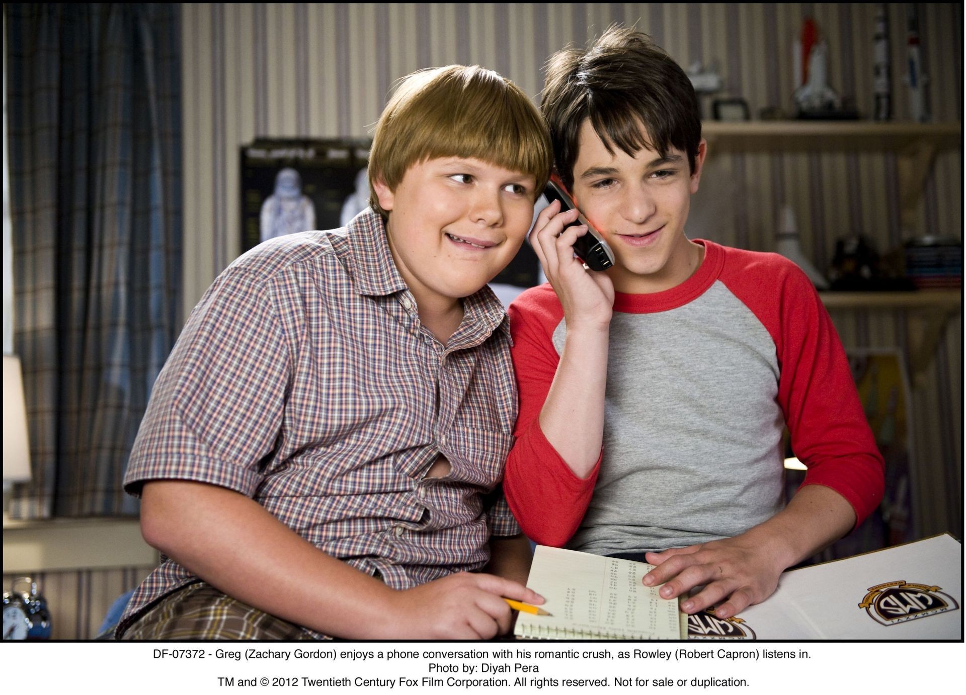 Robert Capron stars as Rowley Jefferson and Zachary Gordon stars as Greg Heffley in The 20th Century Fox's Diary of a Wimpy Kid: Dog Days (2012). Photo credit by Diyah Pera.