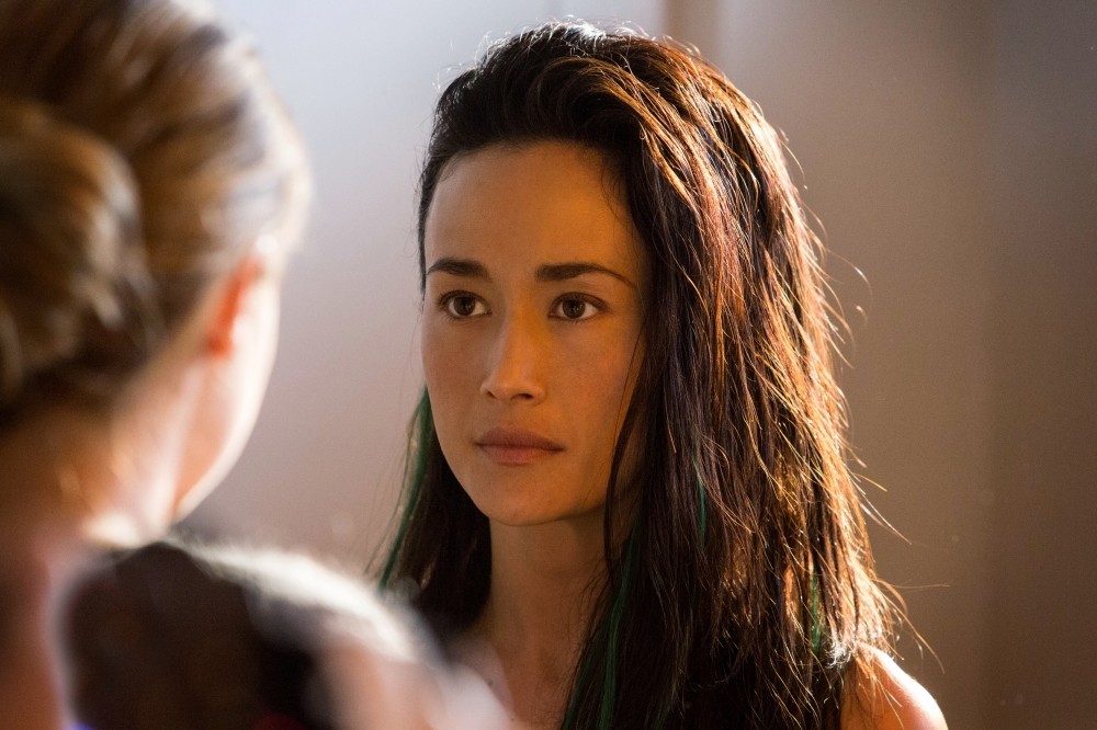 Maggie Q stars as Tori in Summit Entertainment's Divergent (2014)