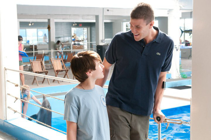 Nathan Gamble stars as Sawyer Nelson and Austin Stowell stars as Kyle in Warner Bros. Pictures' Dolphin Tale (2011)