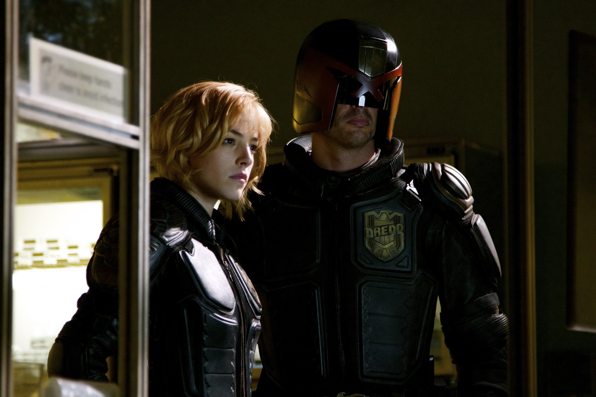 Olivia Thirlby stars as Cassandra Anderson and Karl Urban stars as Judge Dredd in Lionsgate Films' Dredd (2012)