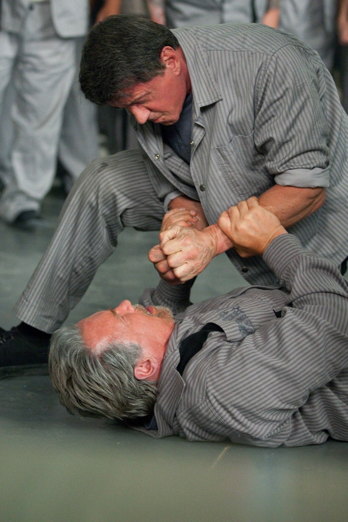 Sylvester Stallone stars as Ray Breslin and Arnold Schwarzenegger stars as Emil Rottmayer in Summit Entertainment's Escape Plan (2013)