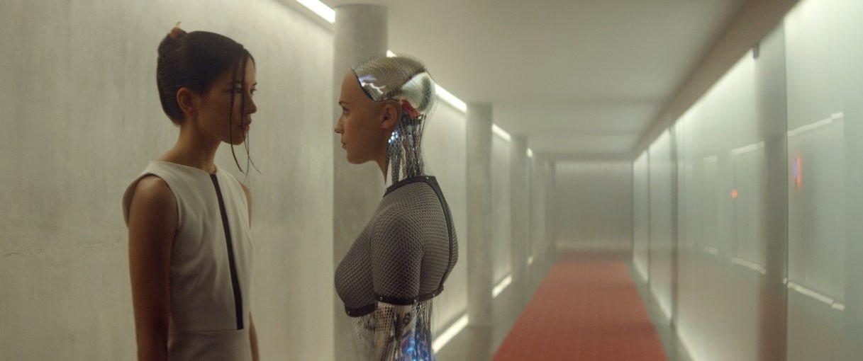 Sonoya Mizuno stars as Kyoko and Alicia Vikander stars as Ava in A24's Ex Machina (2015)