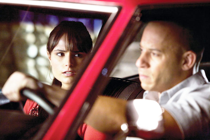 Jordana Brewster stars as Mia Toretto and Vin Diesel stars as Dominic Toretto in Universal Pictures' Fast and Furious (2009)