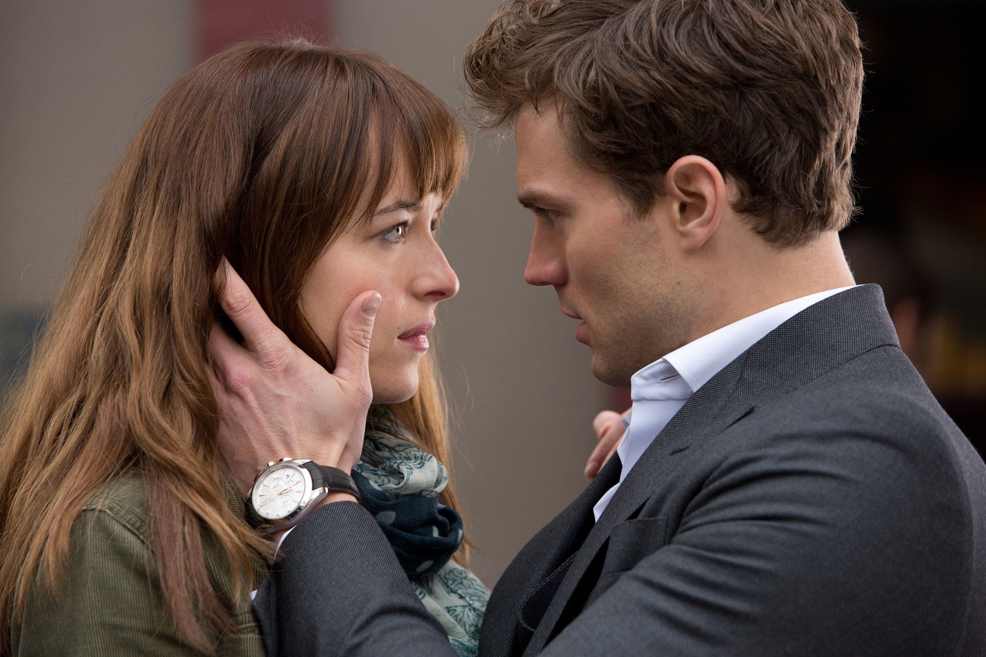 Dakota Johnson stars as Anastasia Steele and Jamie Dornan stars as Christian Grey in Focus Features' Fifty Shades of Grey (2015)