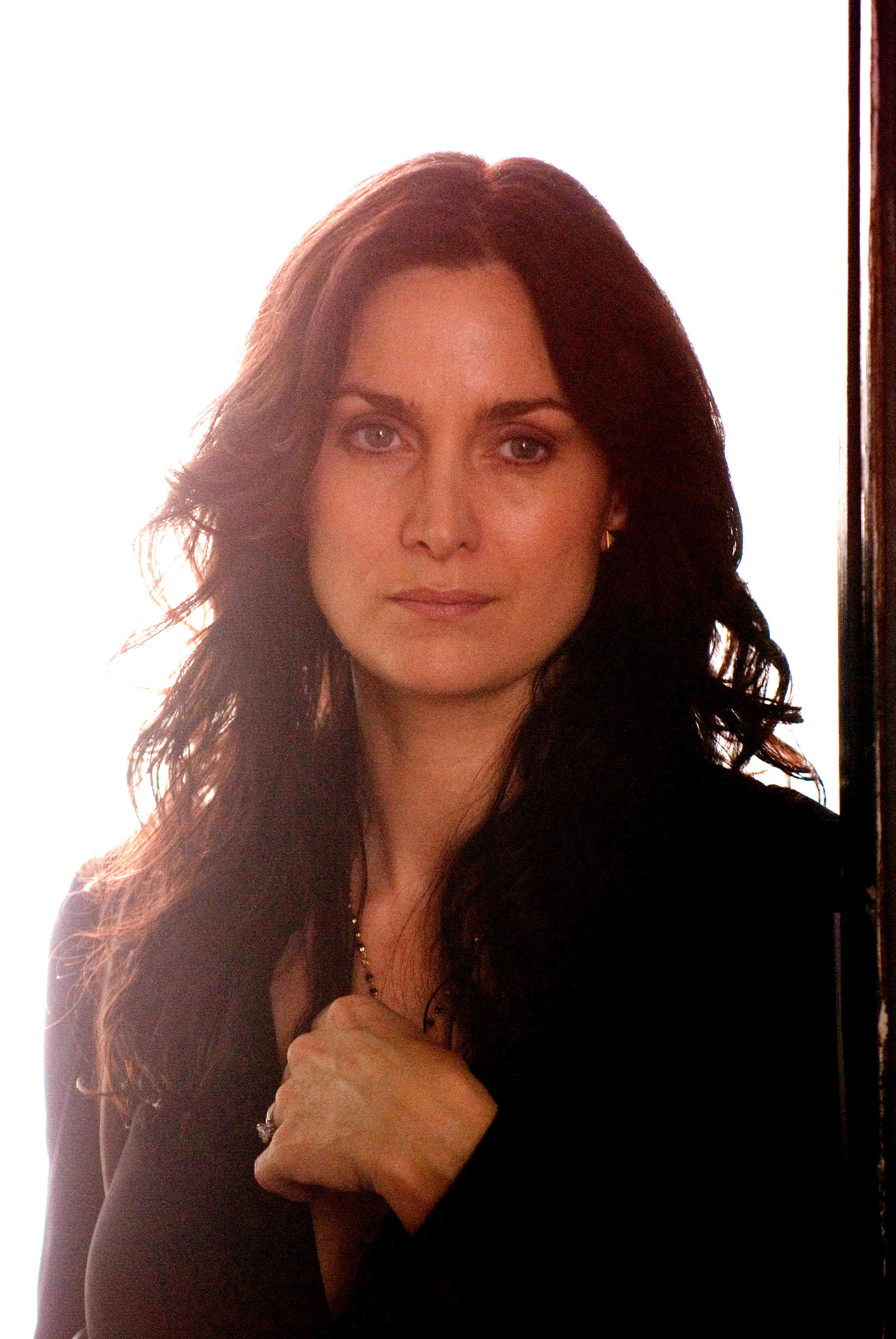 Carrie-Anne Moss stars as Kelly Hanson in Senator International's Fireflies in the Garden (2011)